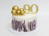 90th Birthday Streaks and Spheres Milestone Cake - The Cake People