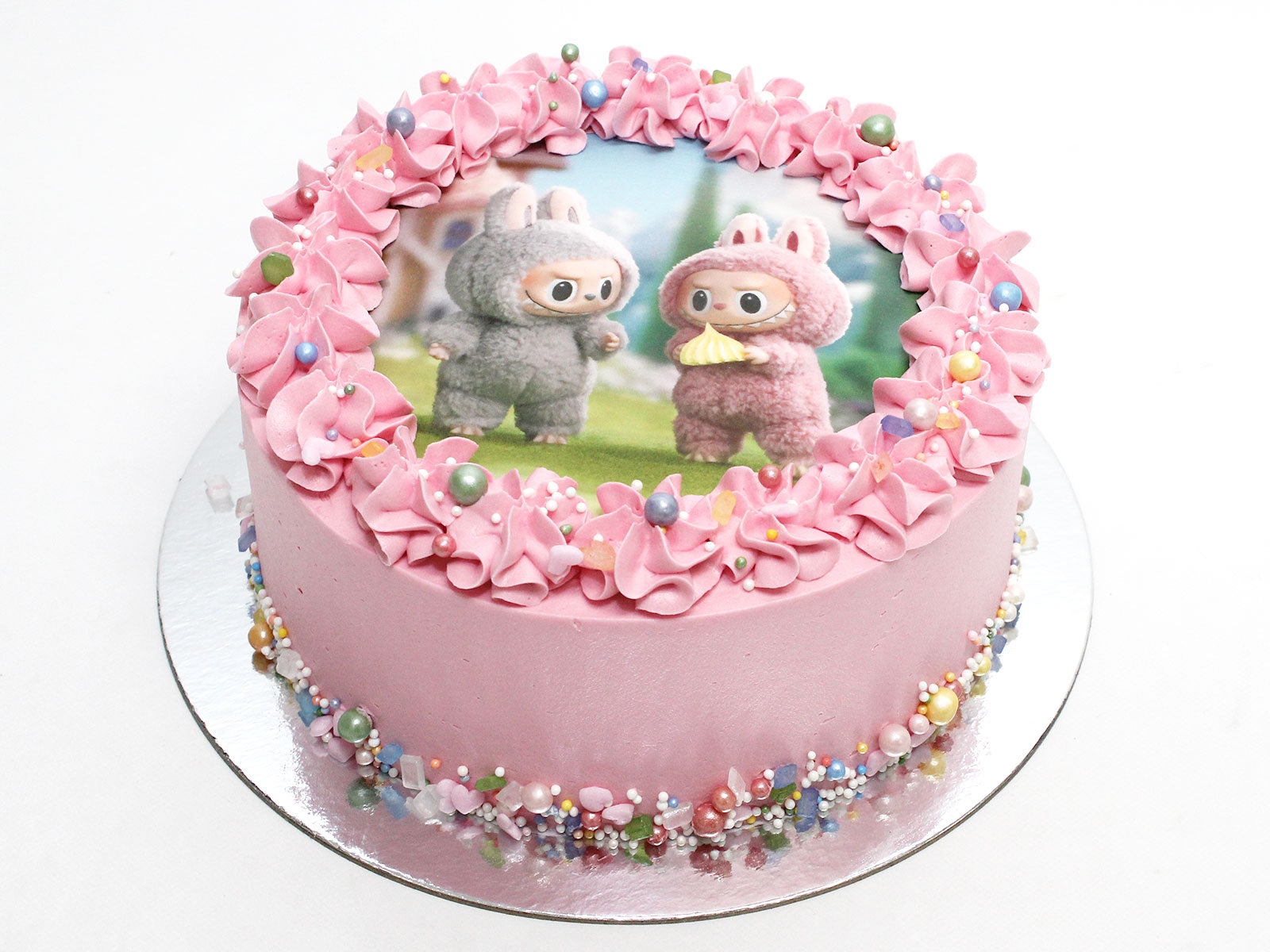 Pink edible image cake for a themed birthday party
